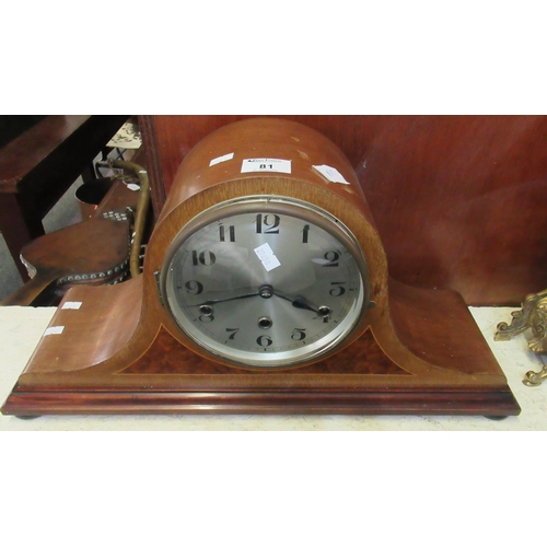 81 - Early 20th Century mixed woods three train hat shaped mantel clock on pad feet.
(B.P. 21% + VAT)