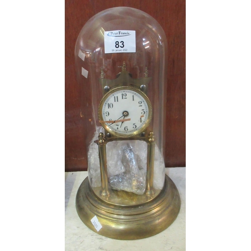 83 - Early 20th Century brass pendulum clock, architectural design, with key and glass dome. 
(B.P. 21% +... 