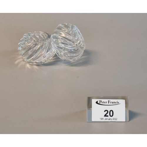 20 - A pair of Baccarat glass writhen design napkin rings in original box. 
(B.P. 21% + VAT)