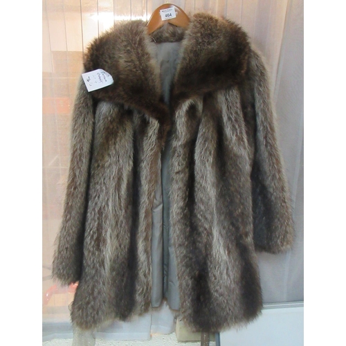 464 - A vintage raccoon fur jacket. 
(B.P. 21% + VAT)