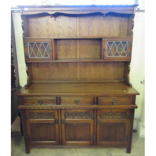 474 - Mid Century oak, 'Old Charm Style' two stage rack backed and lead glazed dresser.
(B.P. 21% + VAT)