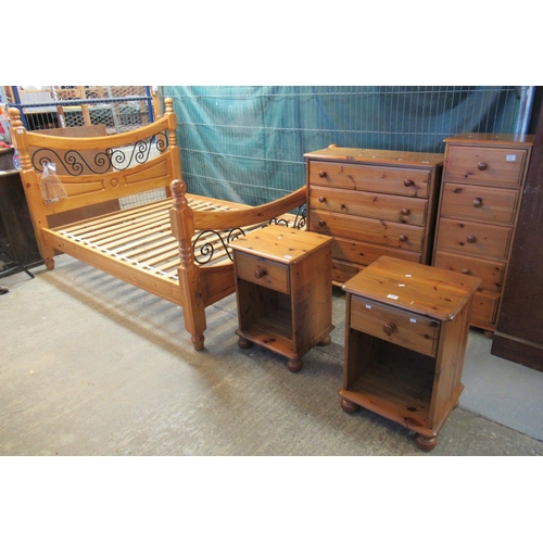 489 - Seven piece modern pine bedroom suite comprising: wardrobe, double bed with slats and frame, straigh... 