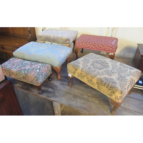 492 - Collection of five mid Century low footstools, all with floral and foliate upholstery, on cabriole l... 