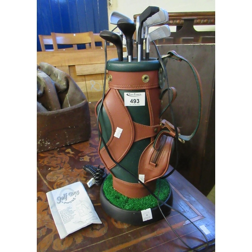 493 - Modern novelty telephone in the form of a golf bag with clubs.
(B.P. 21% + VAT)