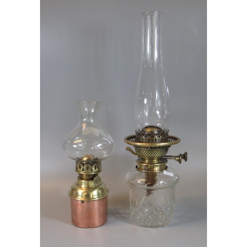 21 - Early 20th Century double burner oil lamp with cut glass reservoir and another early 20th Century si... 