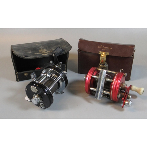 32 - Abu Ambassadeur 6000 fishing reel in leather carrying case, together with another Abu Ambassadeur 60... 