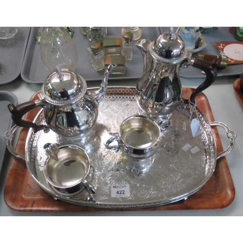 422 - Four-piece silver plated tea set, together with a two-handles pierced and engraved tray.
(B.P. 21% +... 