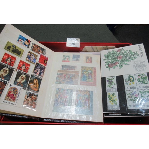 79 - Red box of all world stamps in small stock books, on cards, in envelopes, presentation packs and loo... 