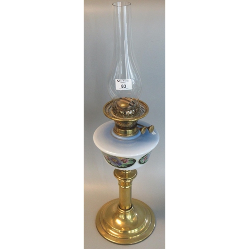 83 - Early 20th Century double oil burner lamp having opaline glass and floral hand painted reservoir on ... 