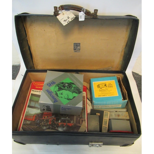 101 - Vintage suitcase, the interior revealing model train items to include: Hornby railways RS609 Express... 