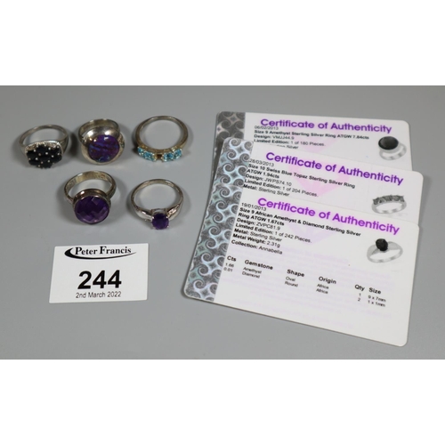 244 - Five silver gemset rings.  Ring size L&1/2, S and U.
(B.P. 21% + VAT)