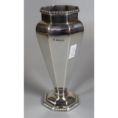 281 - Early 20th century silver spill vase of tapering form, standing on an octagonal beaded base, rubbed ... 