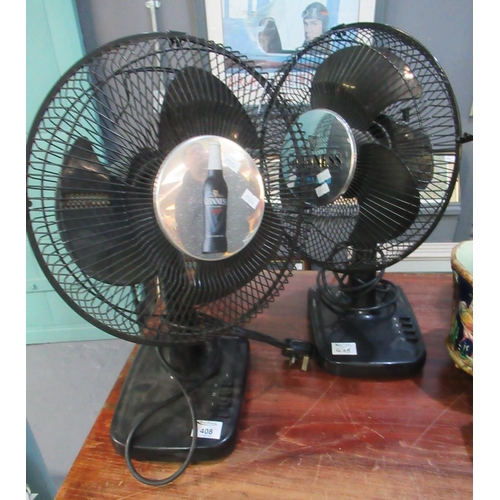 408 - Two similar Guinness advertising table top fans. (2)
(B.P. 21% + VAT)