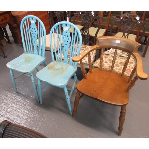 441 - Early 20th century elm smoker bow armchair, together with a pair of painted spindle and wheel back f... 