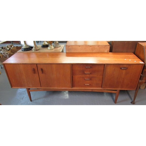 443 - 1960s teak G-Plan style sideboard, appearing unmarked. 209cm long approx.
(B.P. 21% + VAT)