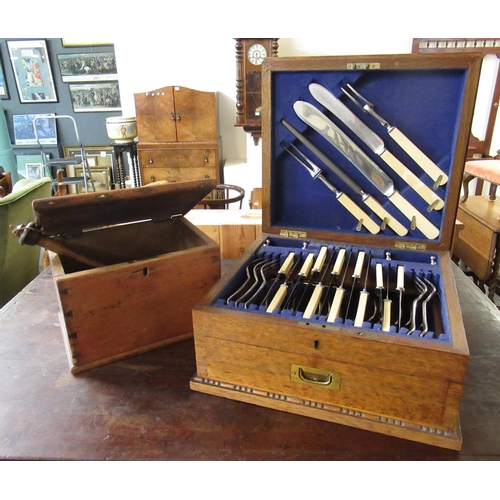 447 - Small pine box, together with an early 20th century oak canteen of silver plated cutlery, etc.
(B.P.... 