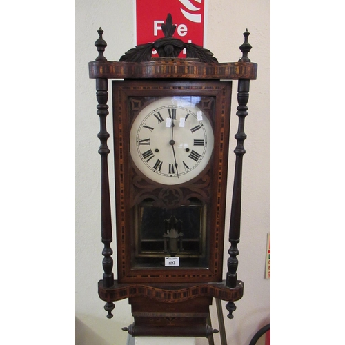 497 - Victorian walnut parquetry inlaid two-train wall clock with key and pendulum.
(B.P. 21% + VAT)