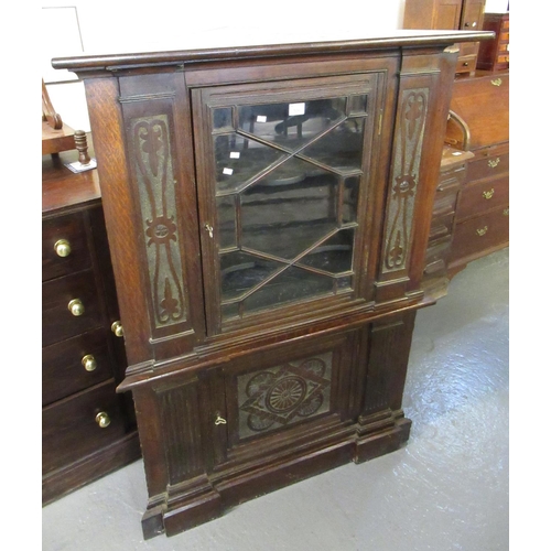 506 - Late 19th/early 20th century oak astragal glazed and carved single door corner cabinet with shaped s... 