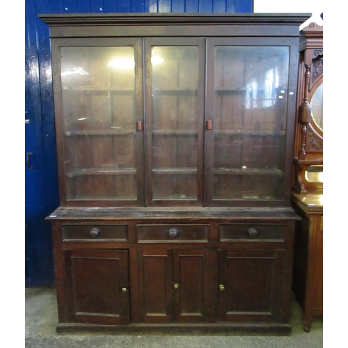 524 - Early 20th century, stained pine, glazed dresser with moulded cornice over two glazed doors with thr... 