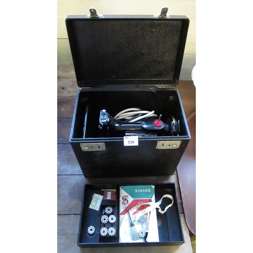 536 - Singer electric sewing machine in original carrying case.
(B.P. 21% + VAT)