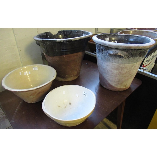 540 - Glazed earthenware crochan/dairy pan, two deep pottery dairy pans and another kitchen bowl. (4)
(B.P... 