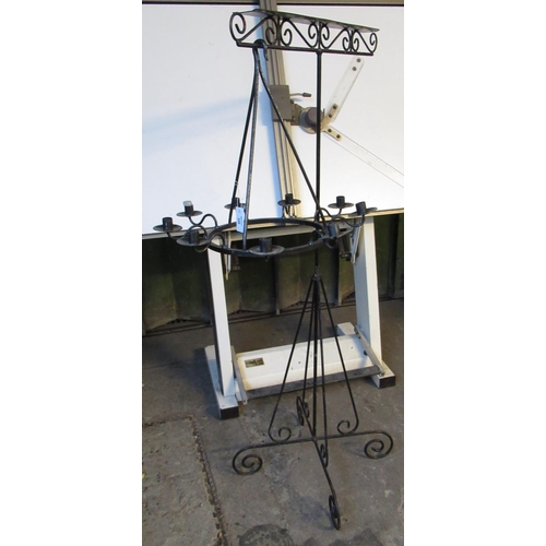 546 - Wrought metal candle light chandelier, together with a wrought metal scroll work stand. (2)
(B.P. 21... 