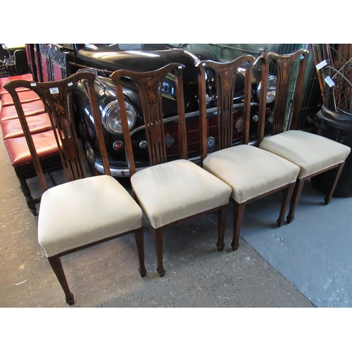 561 - Set of four Victorian rosewood inlaid lyre backed dining chairs with stuff over seats on square tape... 