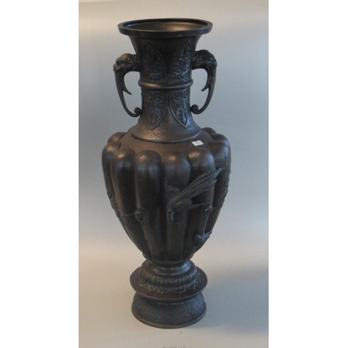 77 - Large Japanese patinated bronze fluted baluster shaped vase with extended neck having elephant head ... 