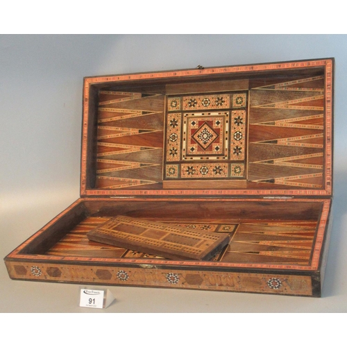 91 - Middle Eastern design parquetry inlaid back gammon box, interior revealing cribbage board.
(B.P. 21%... 