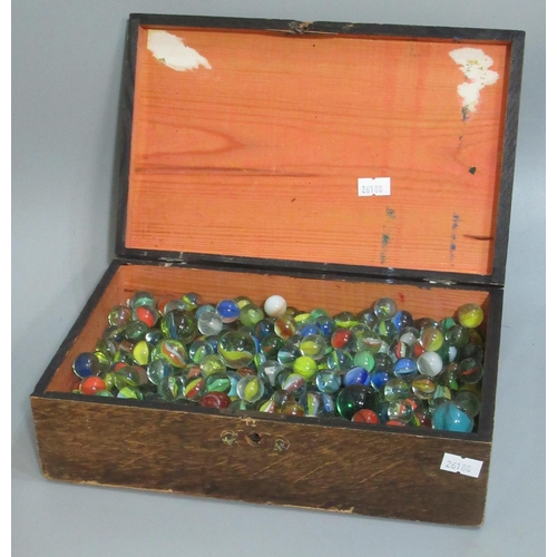 104 - Early 20th century oak box containing a large collection of assorted glass marbles.
(B.P. 21% + VAT)