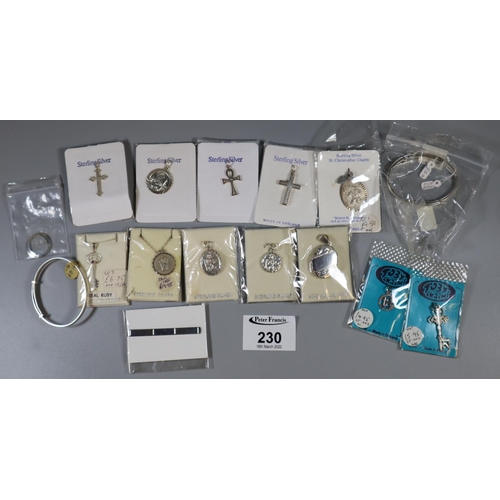 230 - Collection of silver jewellery including St Christopher pendants, cross pendants, baby bangle, locke... 