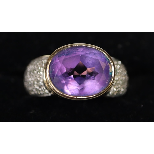 232 - 9ct gold amethyst and diamond ring.  Ring size M&1/2.  Approx weight 5.7 grams.
(B.P. 21% + VAT)