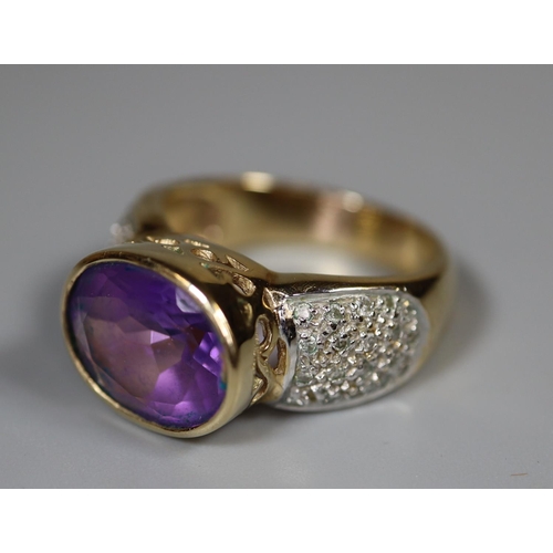 232 - 9ct gold amethyst and diamond ring.  Ring size M&1/2.  Approx weight 5.7 grams.
(B.P. 21% + VAT)