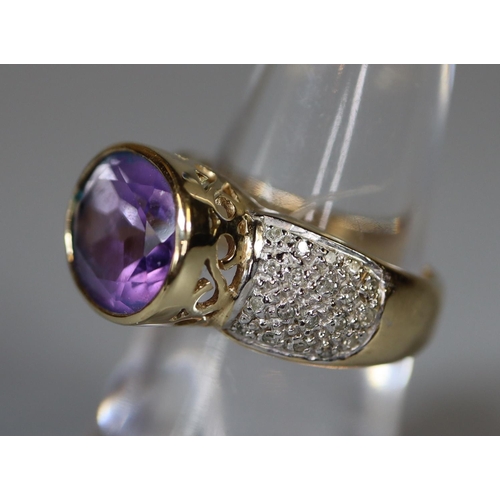 232 - 9ct gold amethyst and diamond ring.  Ring size M&1/2.  Approx weight 5.7 grams.
(B.P. 21% + VAT)