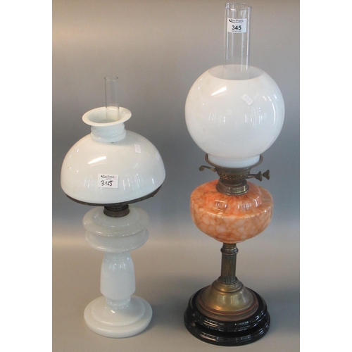 345 - Two early 20th century oil burners, both with opaline glass shade, one with orange marble reservoir.... 