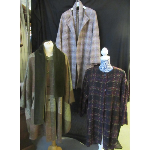 507 - Three vintage and designer garments: two Jean Muir wool and mohair blend belted jackets and an Avoca... 