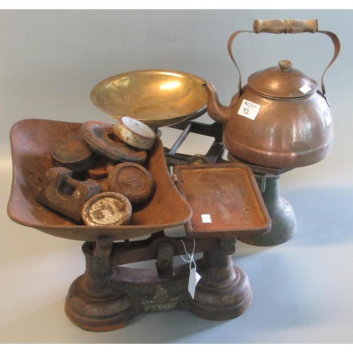 92 - Two vintage cast iron scales with weights, together with a copper kettle.
(B.P. 21% + VAT)