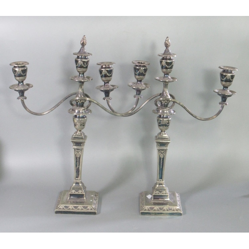 104 - Pair of Adams style silver plated three-branch table candelabra decorated with swags and trailing fo... 