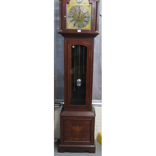 117 - Edwardian inlaid mahogany three train longcase clock having arched brass face with silvered Roman ch... 