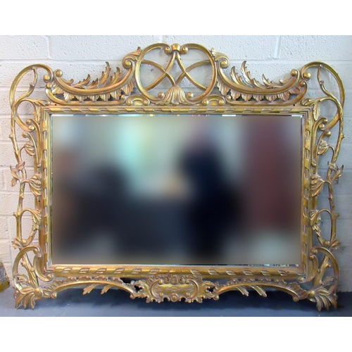 373 - 19th century style gilt Gesso bevel plate mirror, the frame with pierced scroll and foliate decorati... 