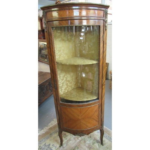 378 - French design kingswood bow front corner cabinet, the moulded cornice above gilded lion mask mounts.... 