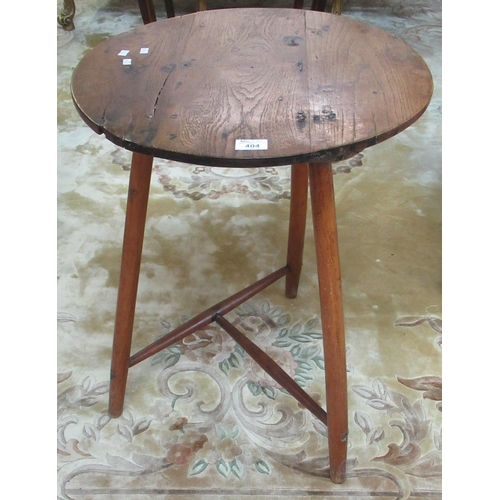 404 - Traditional Welsh oak cricket table with beech frame. 51cm diameter, 69cm high approximately. 
(B.P.... 