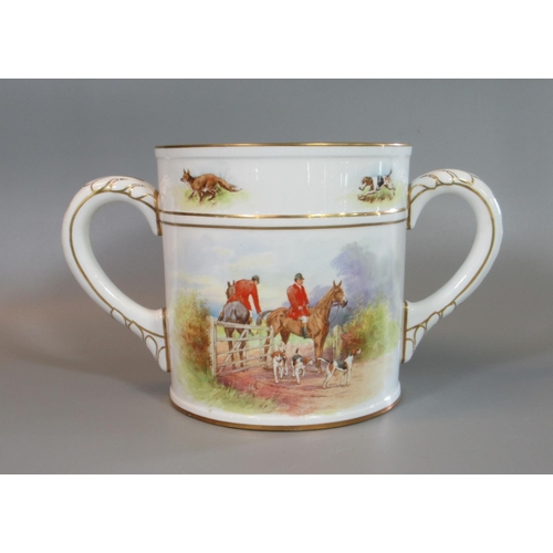 63 - Royal Crown Derby bone china two-handled loving mug decorated to the body with hunting scenes. 18.5c... 