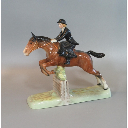 69 - Beswick 868 Huntsman seated on a rearing horse with red jacket and black cap, together with another ... 