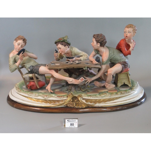 80 - Large Capodimonte figure group 'The Cheats' depicting four boys playing cards at a table, marked Bru... 