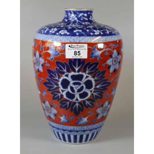 85 - Japanese blue and white on coral ground vase with 'Orchid' mark to base signifying 'Fukagawa Koransh... 