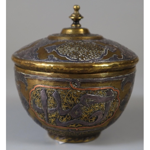 91 - Islamic yellow metal bowl and cover with mixed metal overlay, white metal etc. 9cm high, 8cm diamete... 