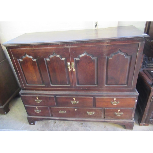 538 - Early 19th Century Welsh oak two stage press cupboard of low proportions, the moulded top above two ... 