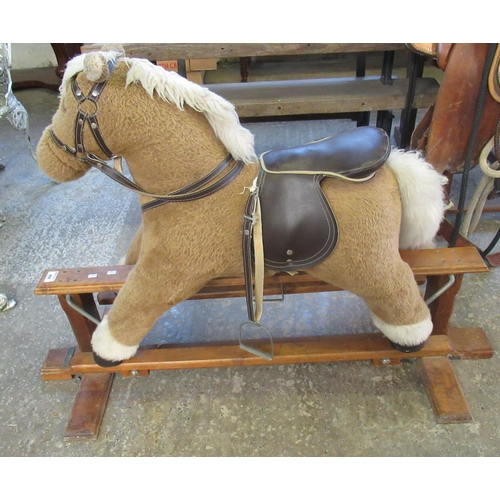 572 - Mamma & Papa's child's rocking horse on swing beech frame.
(B.P. 21% + VAT)