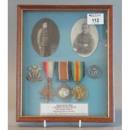 112 - WWI Welsh Regiment Medal Trio to include 14-15 Star War Medal, Victory Medal, cap badge, services re... 